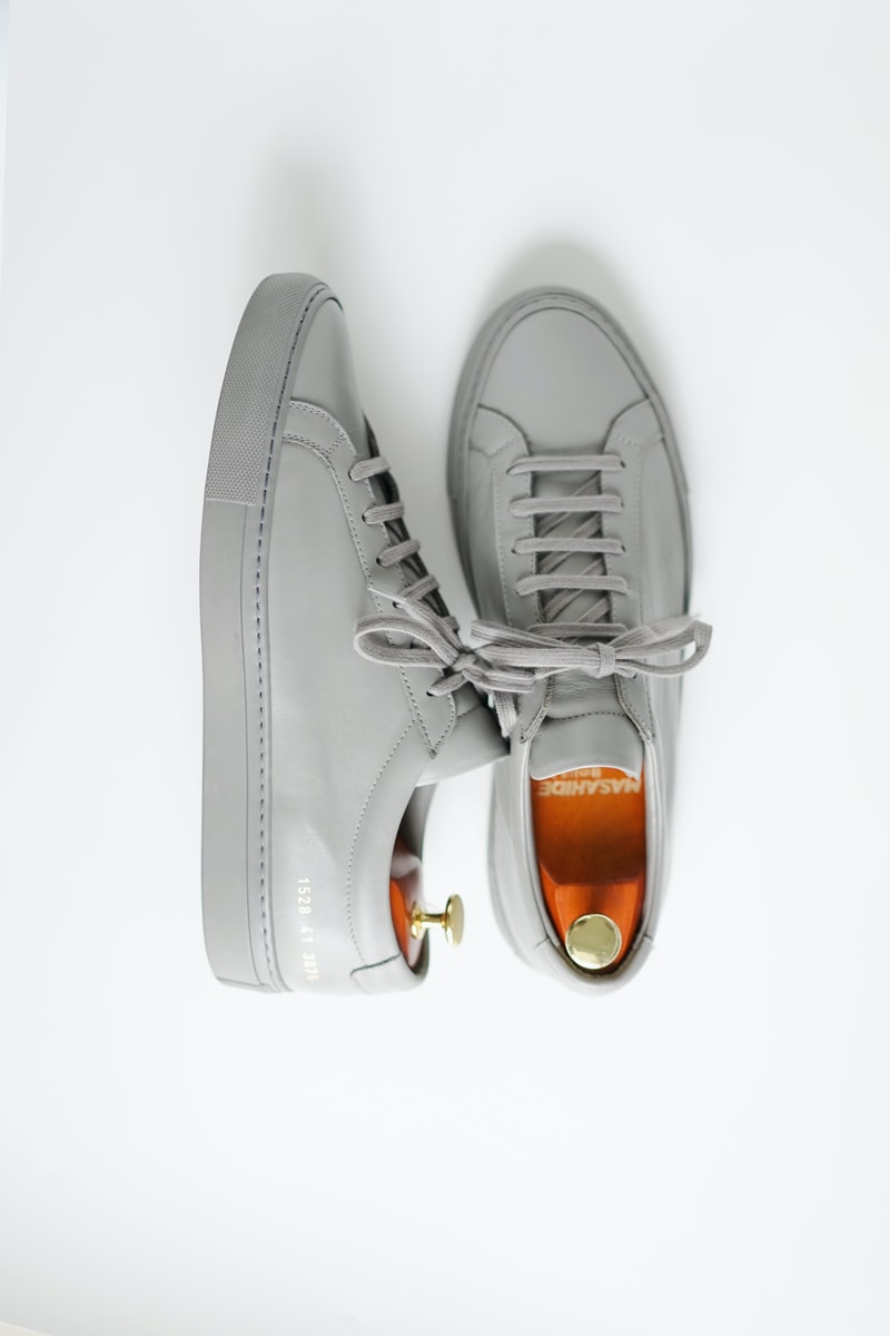 gray and orange nike low top sneakers